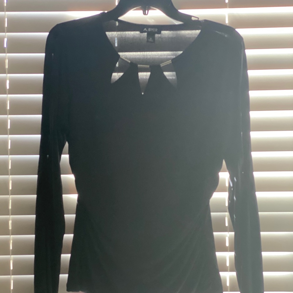 Beautiful blouse for semi formal occasion.